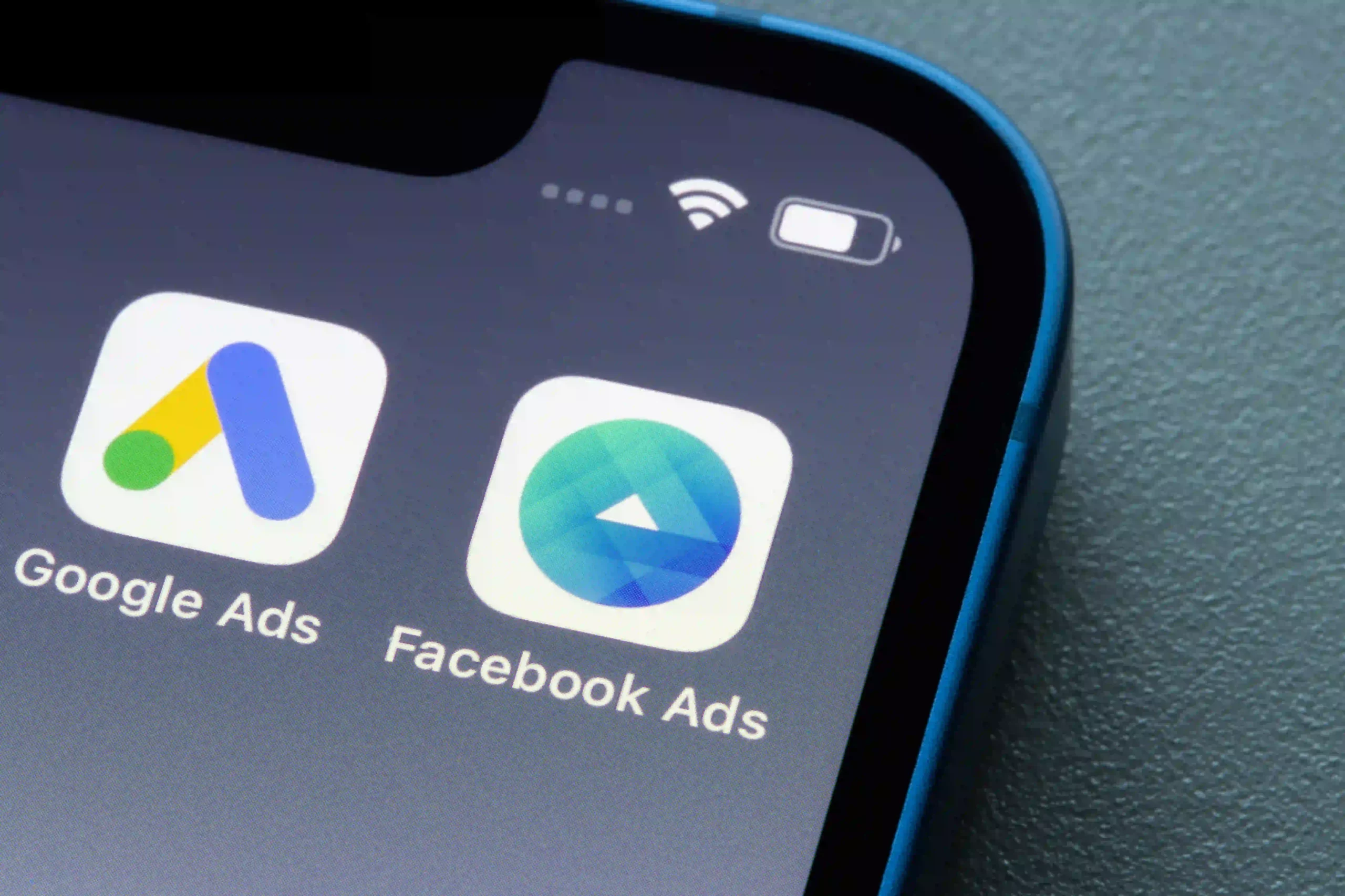 Google & Meta Ads Iphone displaying Google & Meta Ads apps on home screen<br />